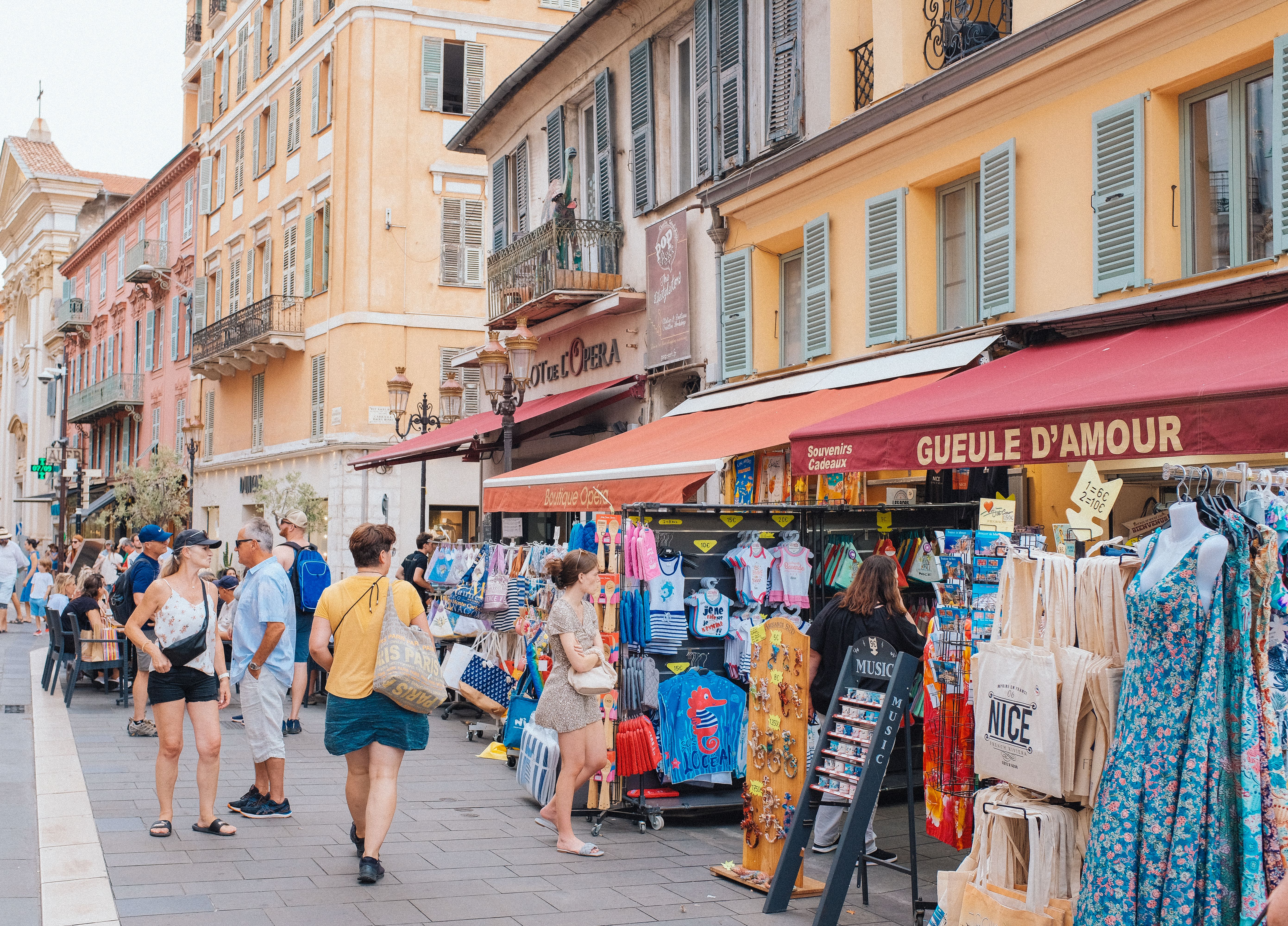 Shoppers in a street market in Nice, France | Source: Pexels