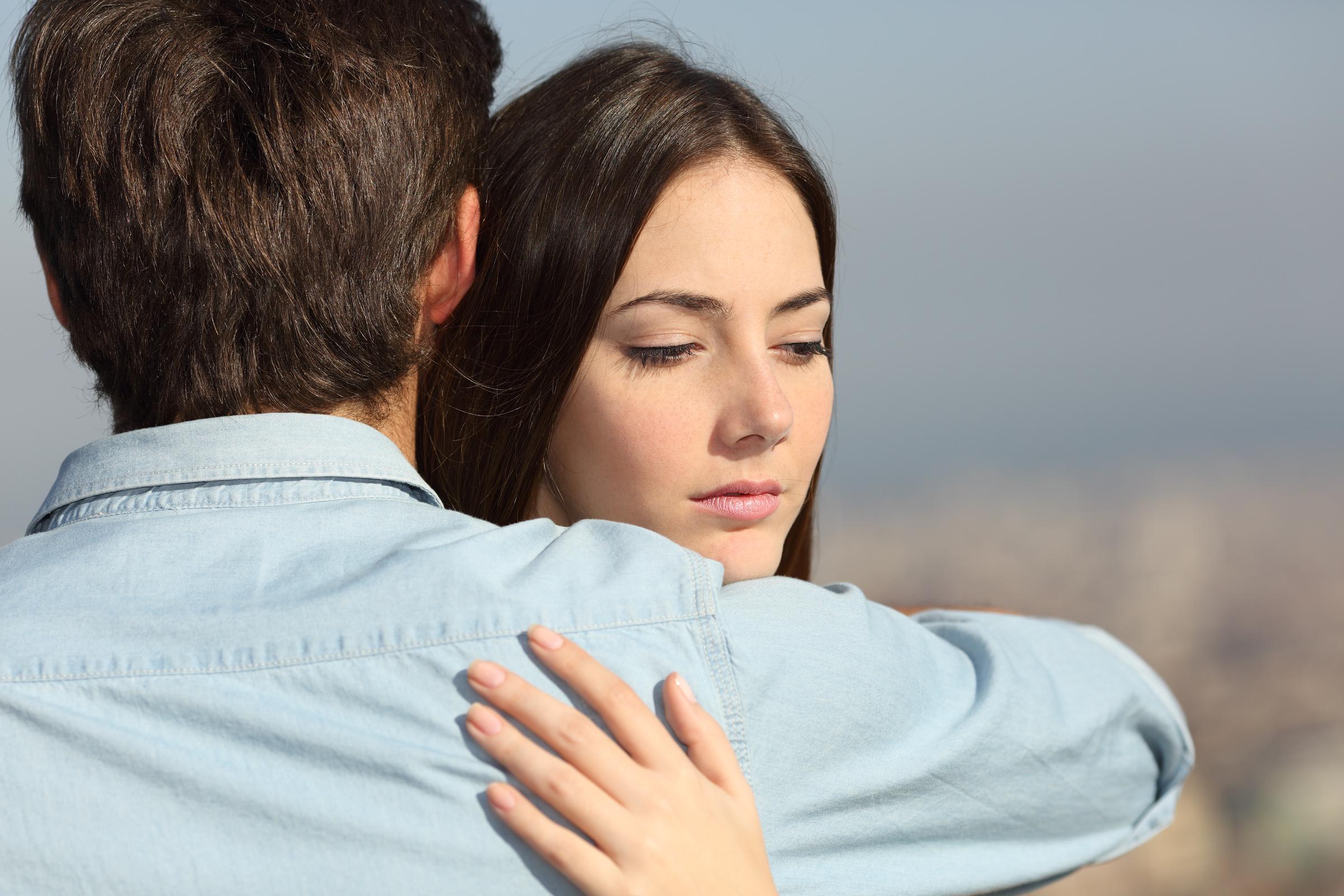 A woman hugging a man | Source: Getty Images
