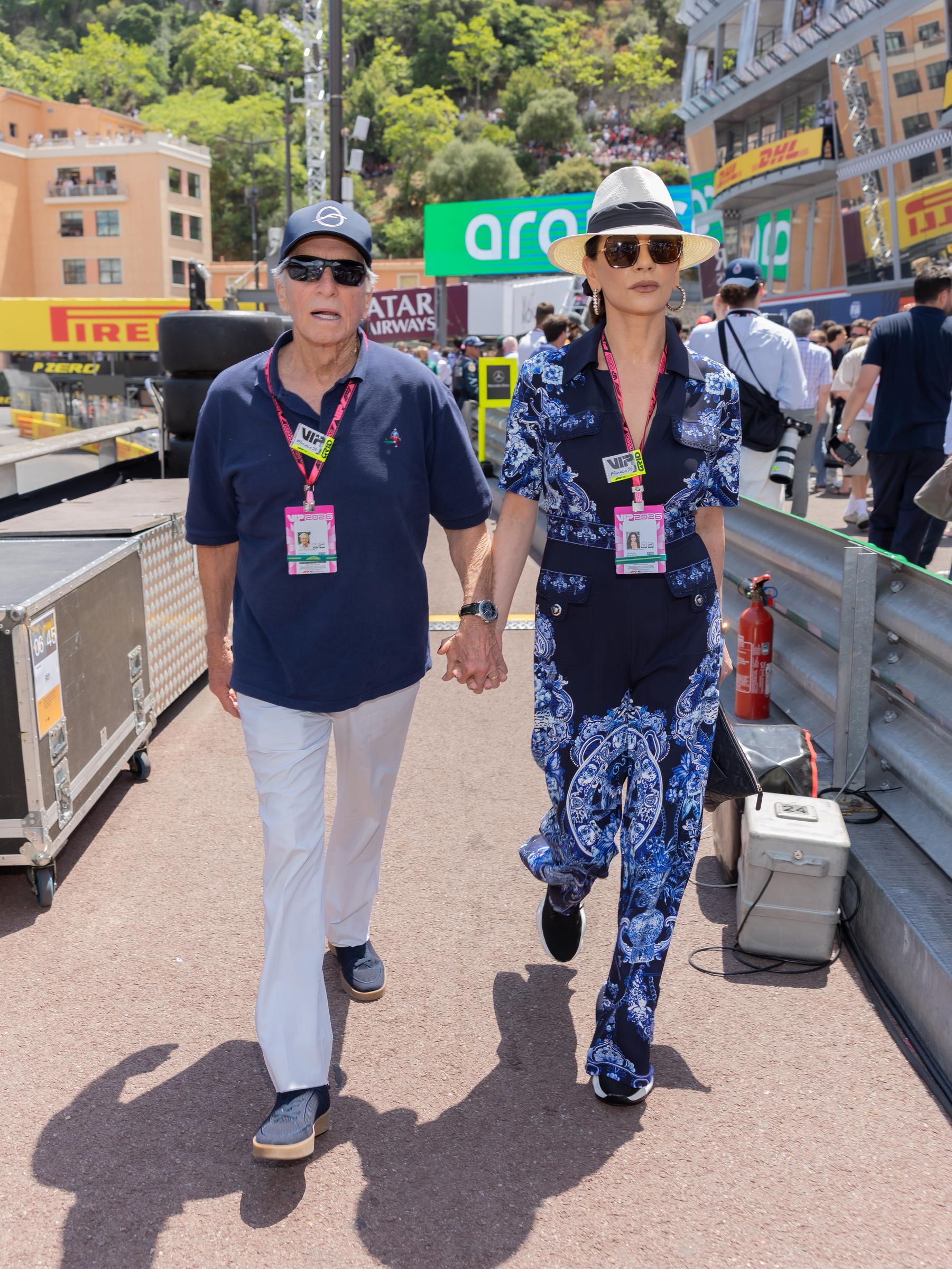 Michael Douglas and Catherine Zeta-Jones attend the F1 Grand Prix of Monaco at Circuit de Monaco in Monte-Carlo, Monaco, on June 7, 2026. Douglas eventually married Zeta-Jones in 2000 after his divorce from Diandra Luker was finalized. | Source: Getty Images