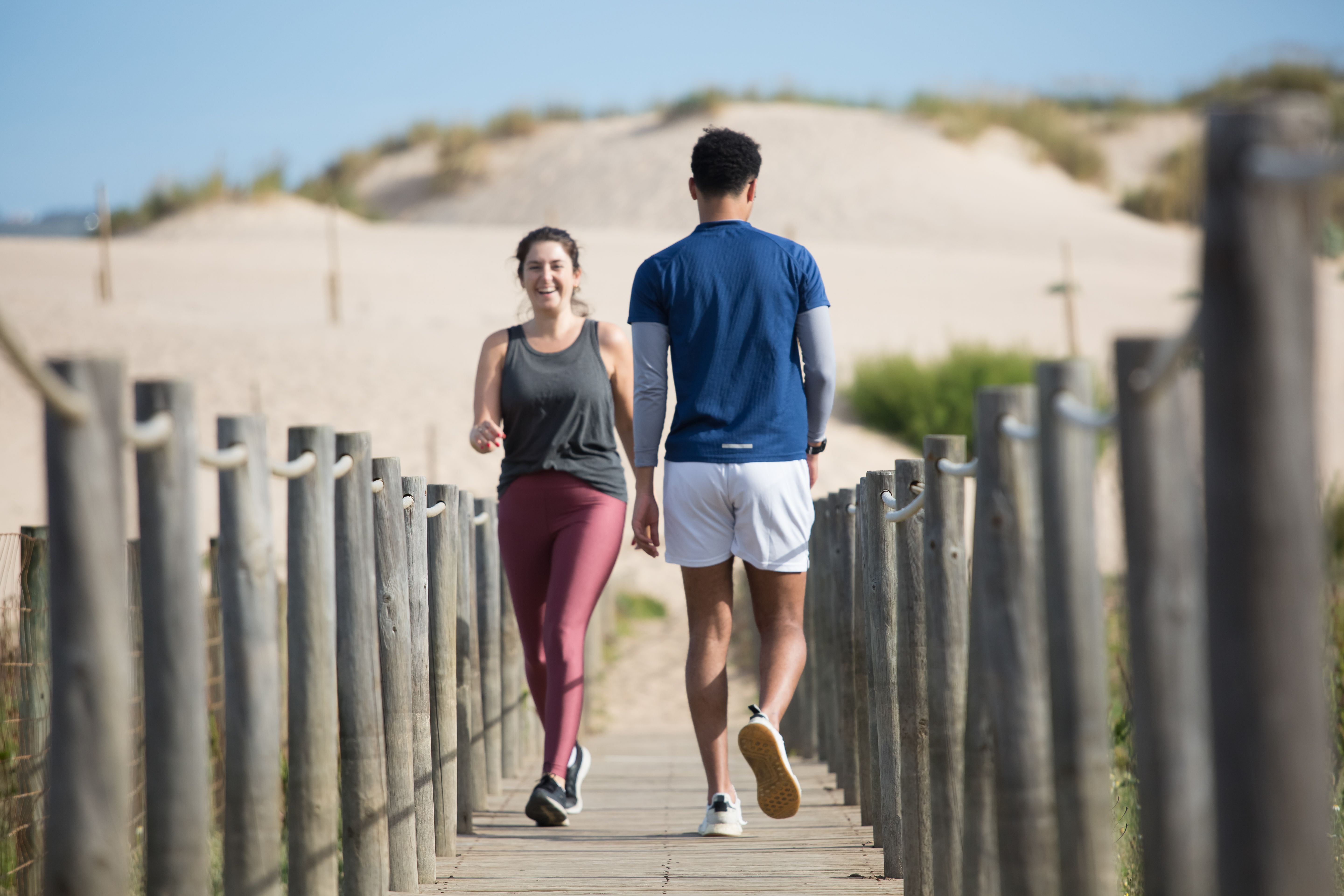 Two people walking towards each other | Source: Pexels