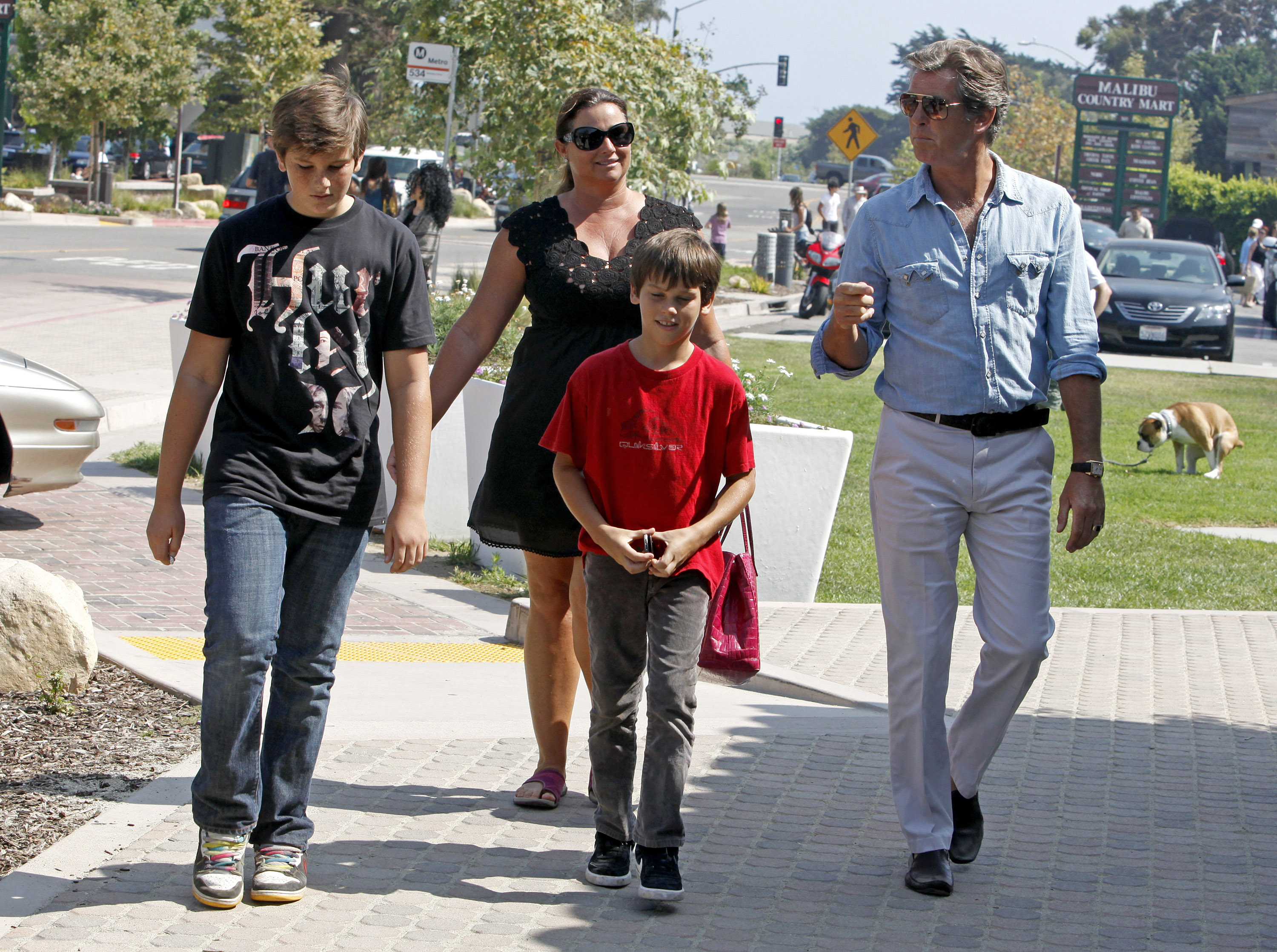 Pierce and Keely Shaye Smith were photographed with their young sons, Dylan and Paris, during a family outing in Malibu in August 2009. The candid moment offers an earlier glimpse of the foursome years before Paris and Dylan returned to the red carpet with their parents as adults. | Source: Getty Images